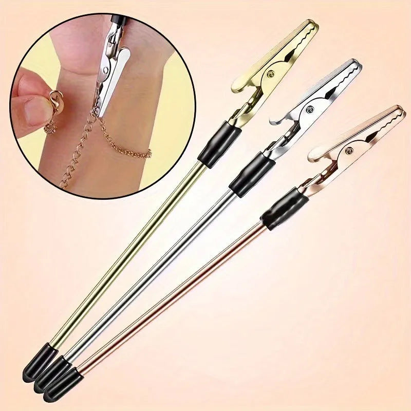 Gold-plated iron rod alligator clip note holder 155mm on a desk holding a paper note