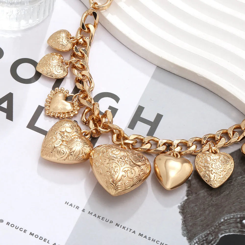 Carved heart pendant necklace on adjustable chain in gold or white K colour