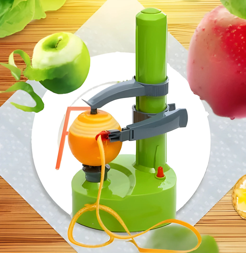 White electric fruit and vegetable peeler machine with stainless steel blades on a kitchen worktop.