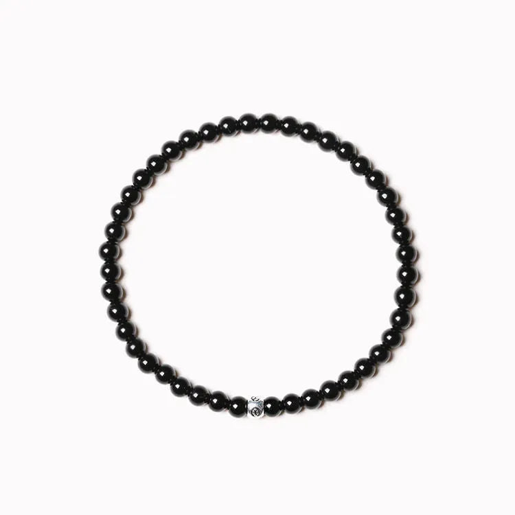 Electroplated agate obsidian blue San bracelet with 4mm geometric beads on wrist