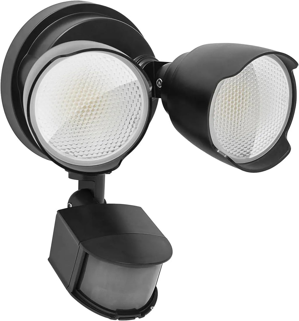 White 120V LED security floodlight with motion sensor mounted on an exterior wall.