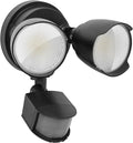 White 120V LED security floodlight with motion sensor mounted on an exterior wall.