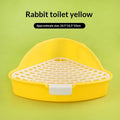 Triangular plastic pet toilet for rabbits, shown as a corner potty in blue, pink, white or yellow