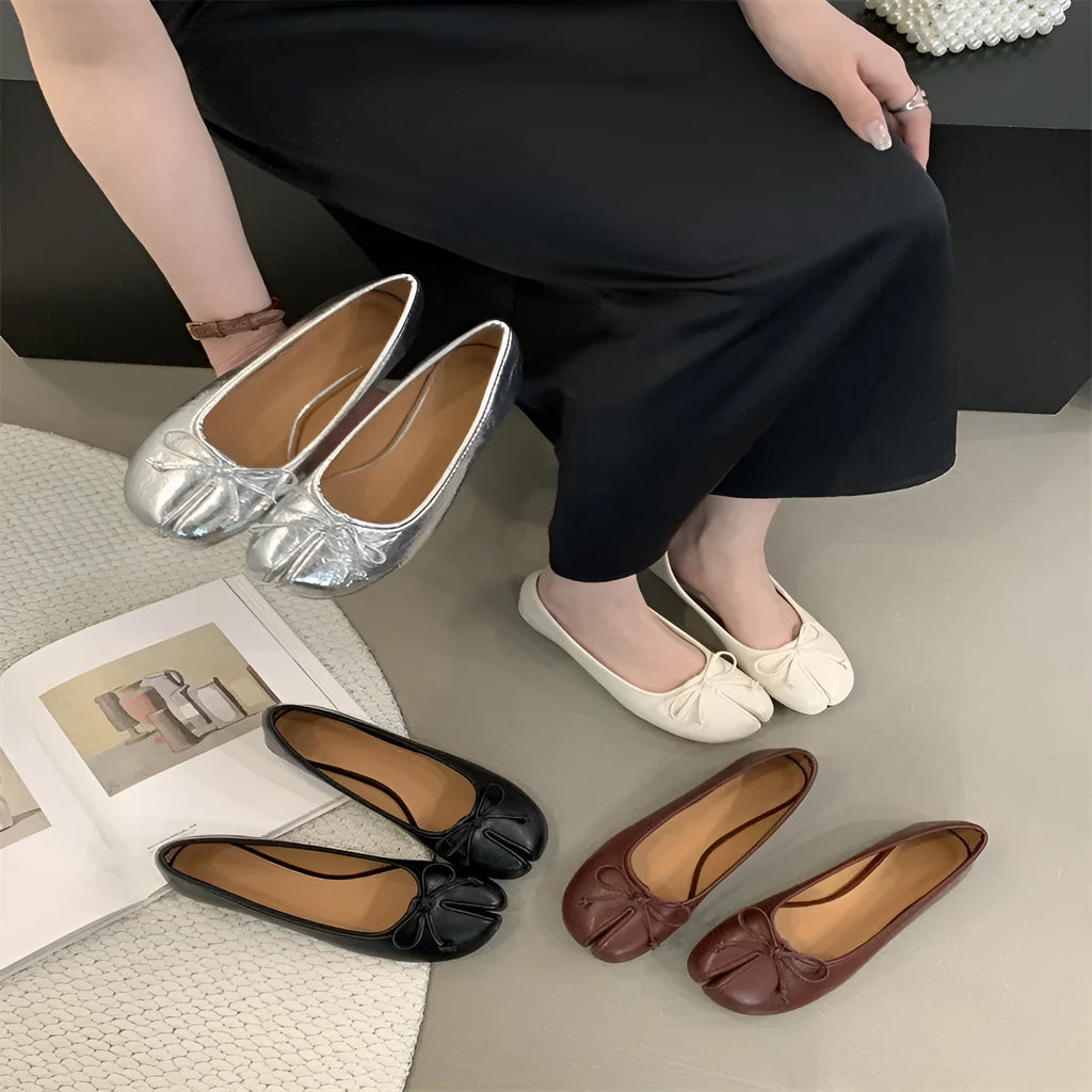 Women's flat split-toe pumps in black, silver, beige, and red with an oversleeve design.