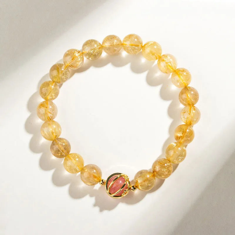 Gold rutilated quartz crystal bracelet with diamond cut stones in unisex Korean style design