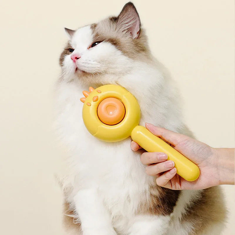Purple, white, or yellow self-cleaning pet grooming brush with stainless steel bristles.