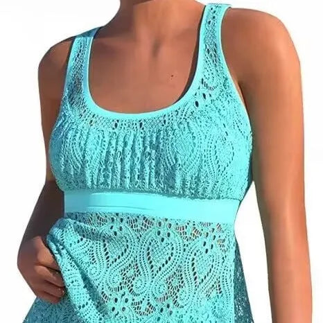 Women's conservative hollow cut two-piece swimwear set with sleeveless top and brief bottoms in solid colour