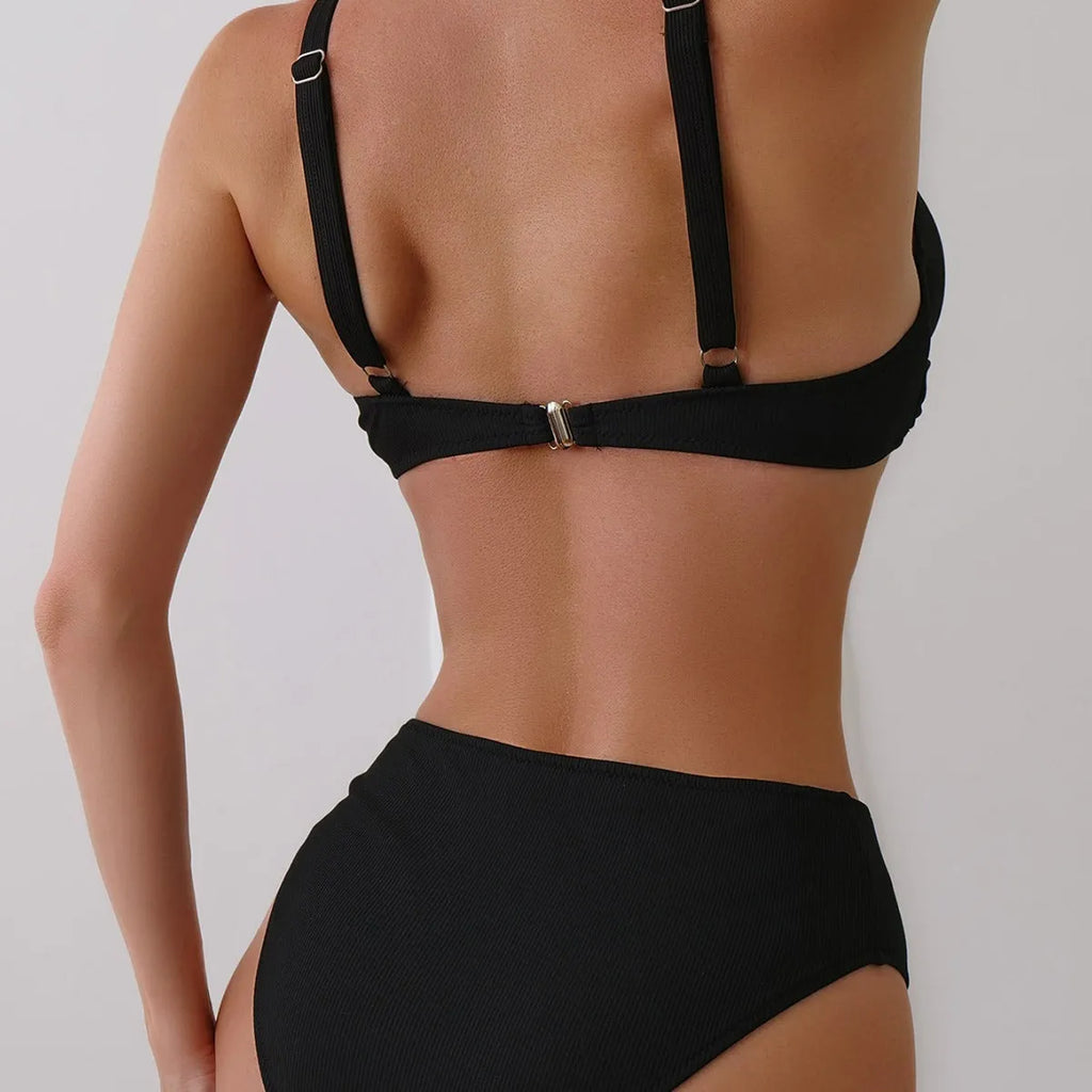 Women's solid colour rib fabric bikini set in black, green, or blue.