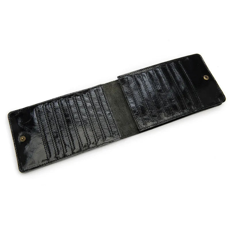 Men's long leather wallet open showing 18 card slots, cash compartment, and phone pocket.