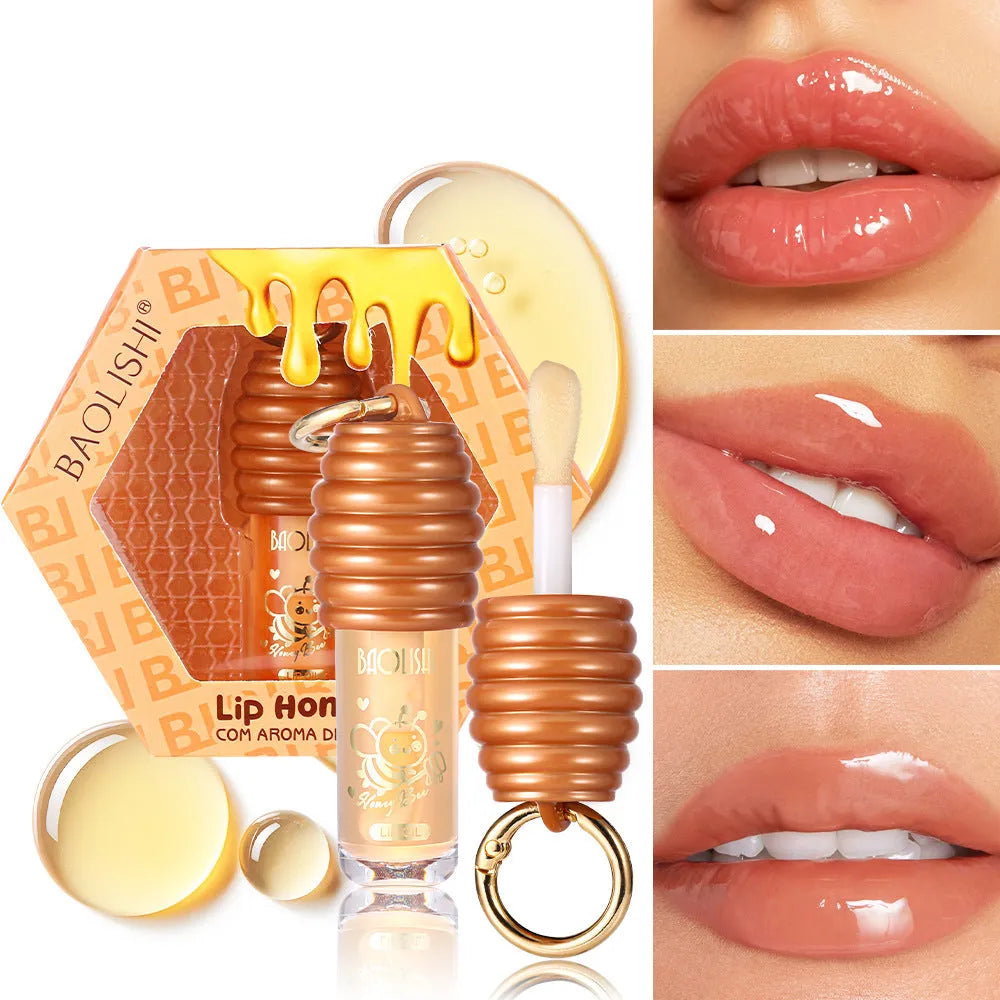 Honey lip gloss with keychain attachment in portable packaging
