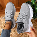 Lightweight lace-up Flyknit sneakers with shallow mouth in beige, low top and flat heel