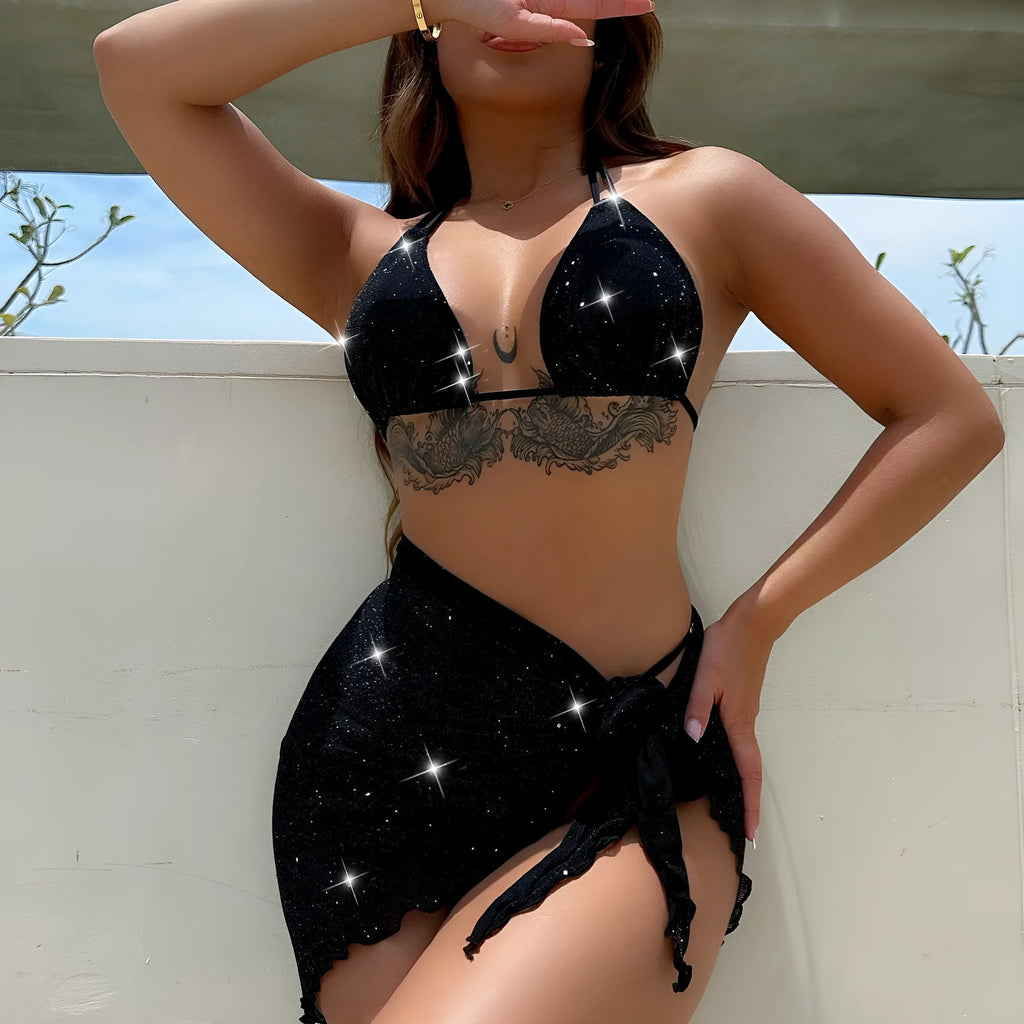 Black three-piece swimsuit bikini set with matching shorts on a mannequin