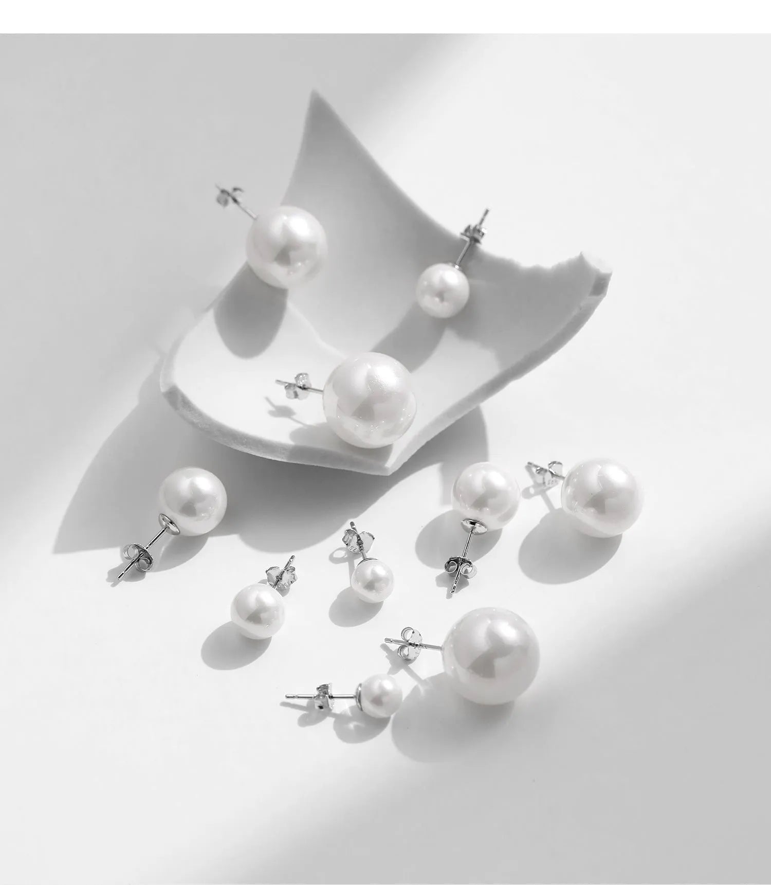 Light luxury French pearl earrings for women in 925 sterling silver with diamond setting, available in 6mm to 14mm sizes