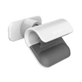 Black universal car phone holder with 360-degree rotating head on a car dashboard
