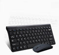 Black and white wireless keyboard and mouse set on a desk.
