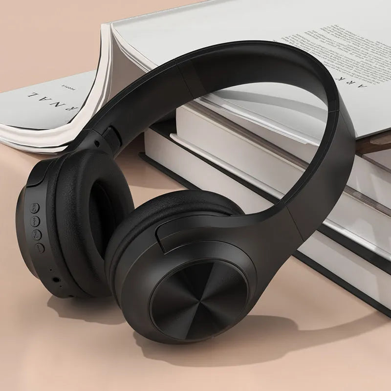 Wireless Bluetooth headphones in chalk black, ivory white, and youth green colours with creative design