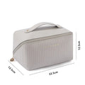 Vertical pattern pillow makeup bag in PU leather with cubic 22.5cm dimensions for travel storage