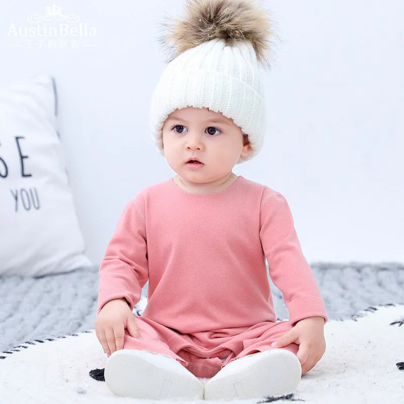 Baby pajama climbing suit in 100% polyester with blue colour, footed Siamese style, on white background