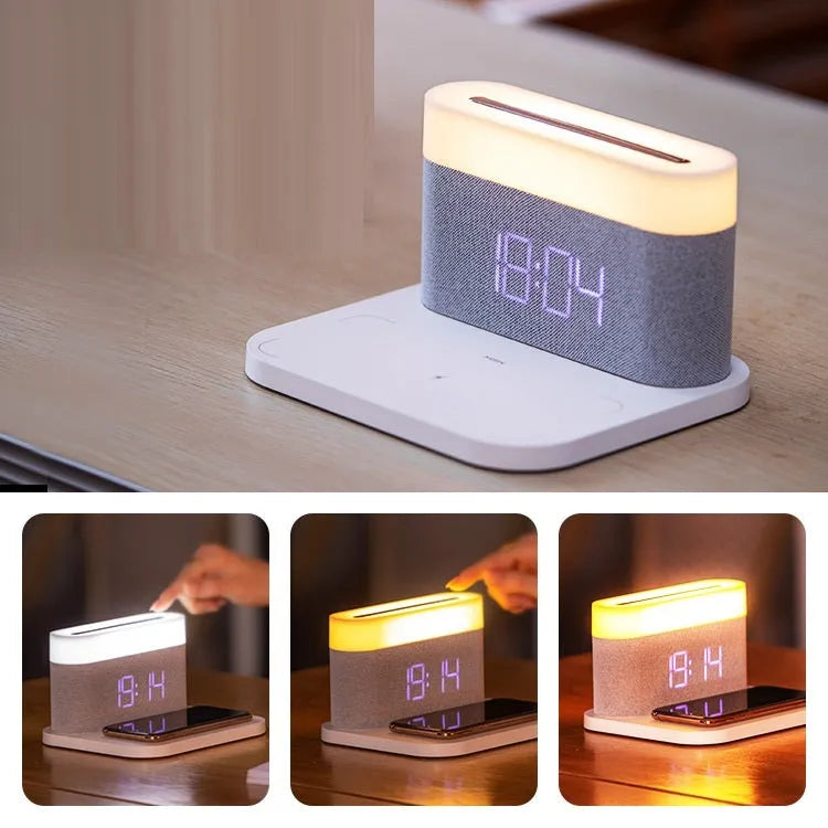 Black or white table lamp with integrated wireless phone charger, LED clock display, and nightlight functions