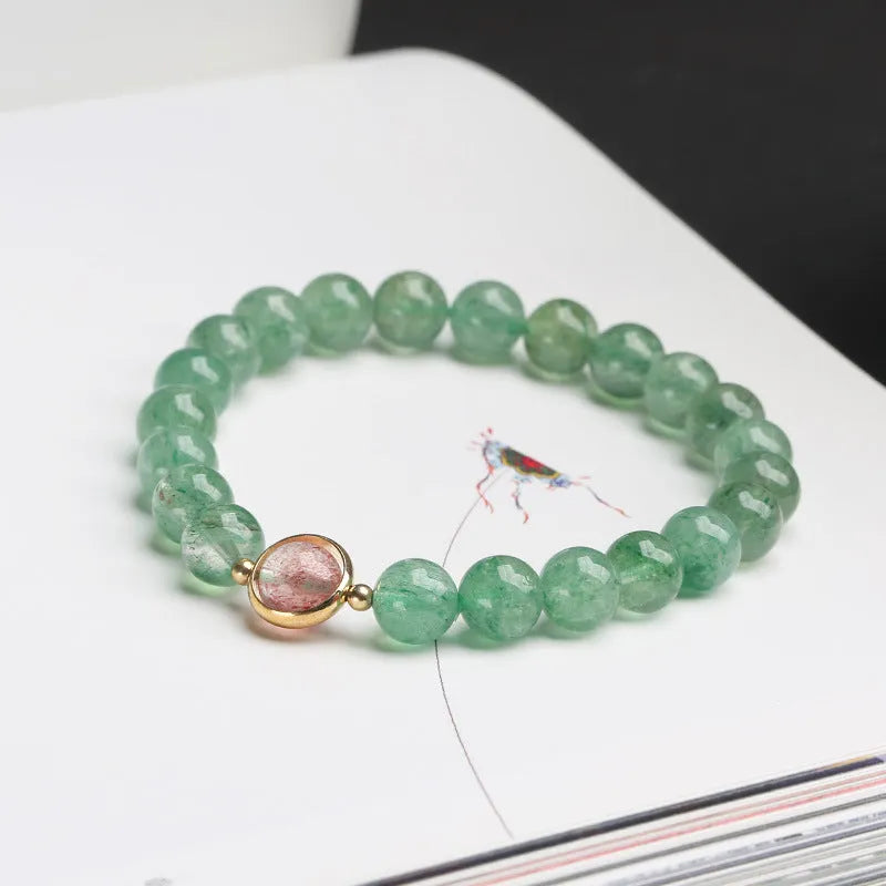 Natural green strawberry quartz bracelet with 7.5mm beads in geometric pattern