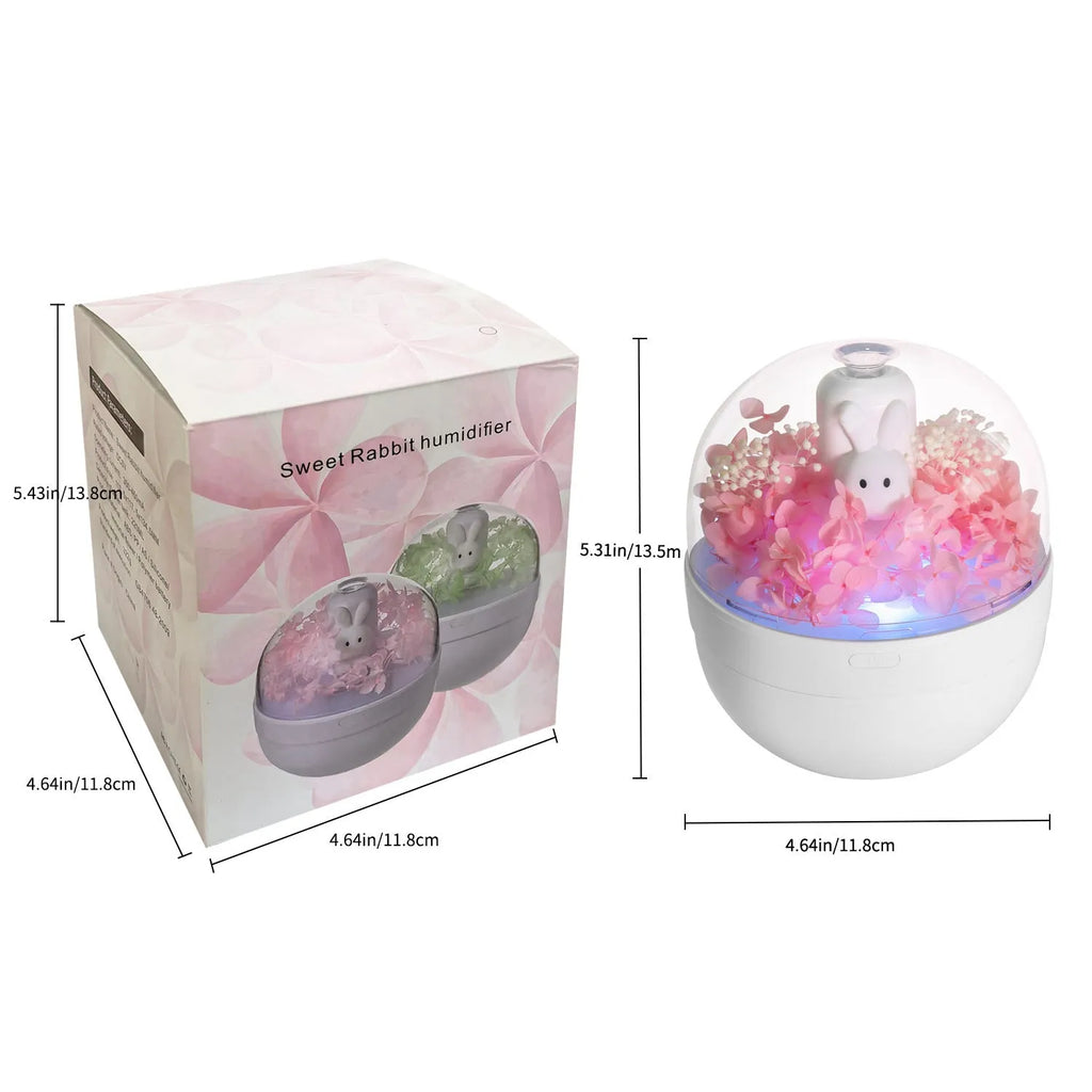 Pink Creative Rabbit aromatherapy humidifier with preserved flowers on top.