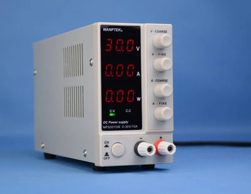White adjustable DC bench power supply unit with displays and controls for voltage and current.