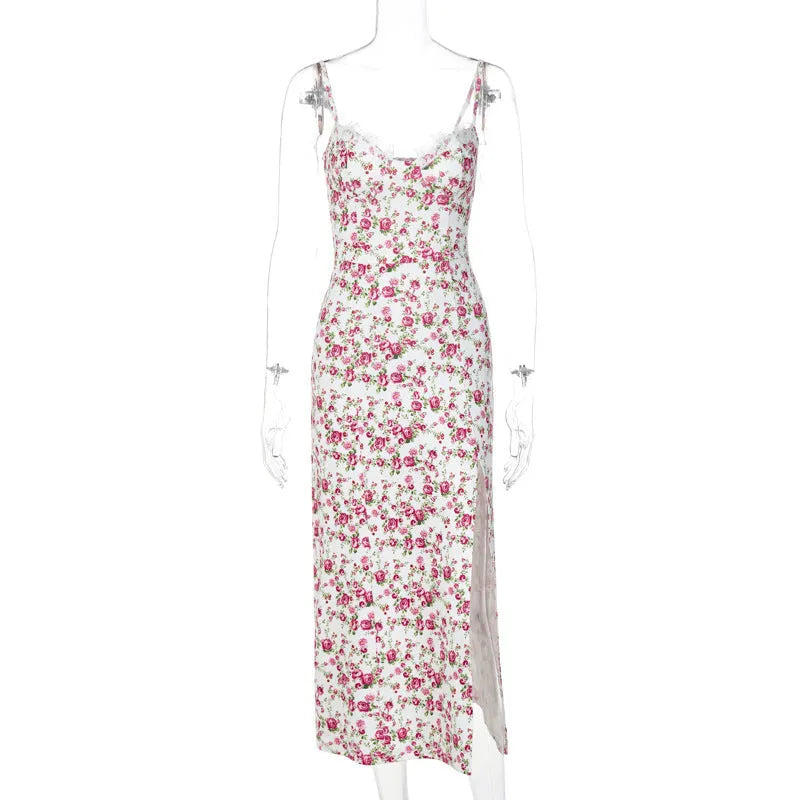 Blue lace floral print long dress on a model, showing side slit and suspender straps.
