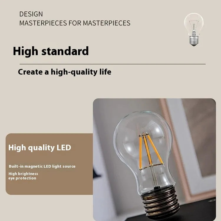 Suspended bulb creative night lamp with wooden base on desktop