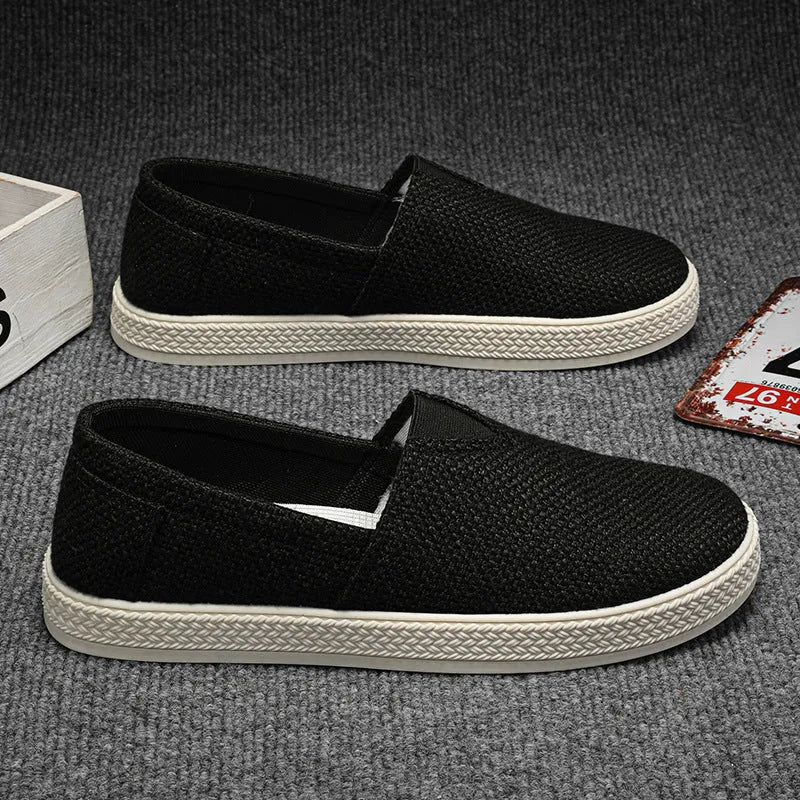 Men's beige canvas shoes with round toe and shallow mouth design on PVC sole
