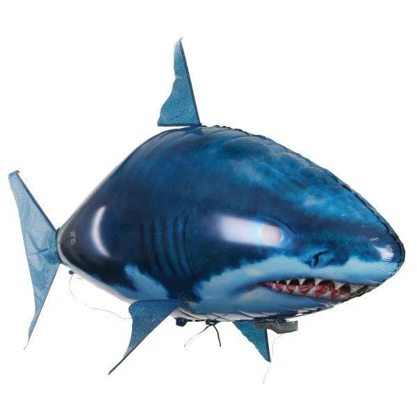 Large remote control shark inflatable balloon flying indoors with remote controller.