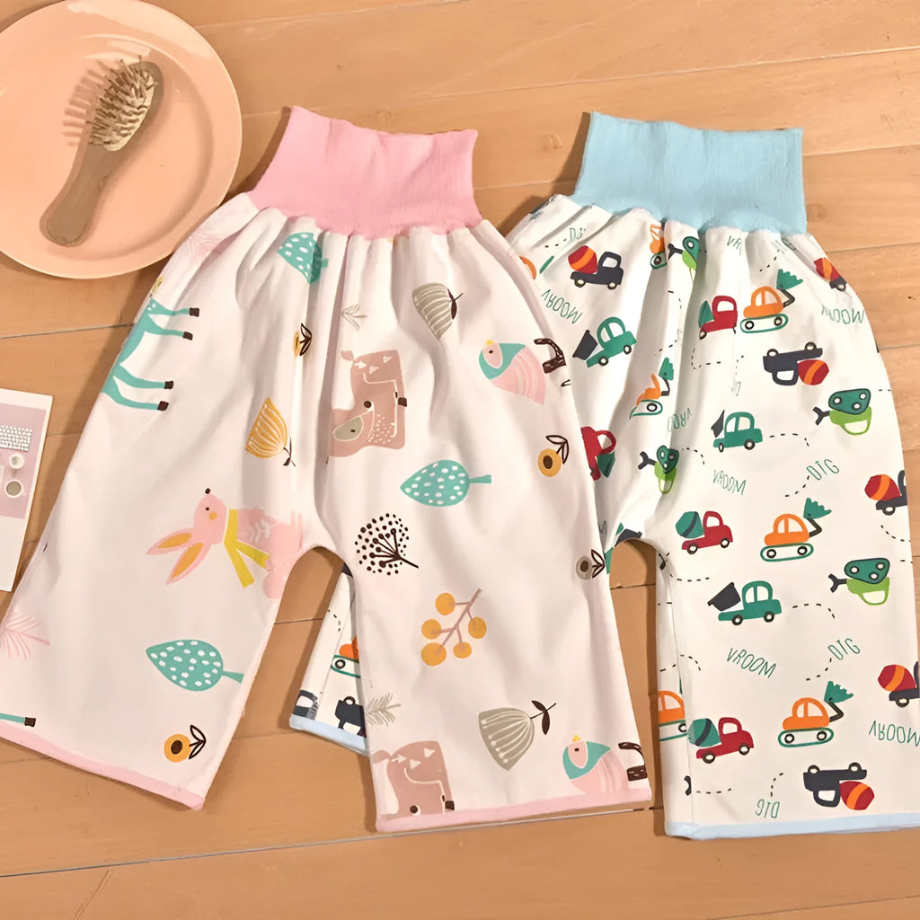 Baby diaper training pants in cotton with waterproof layer, high waist design with cartoon prints