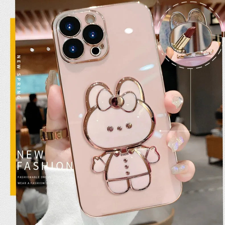 Cartoon rabbit stand mirror iPhone case in TPU with electroplated 3D design and anti-fall protection.