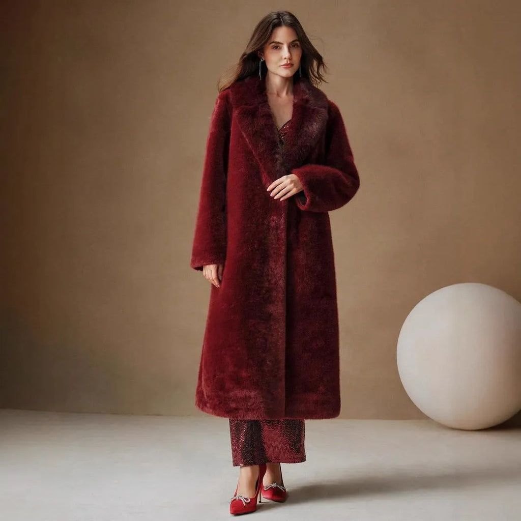Women's lengthened faux fur coat in camel colour, showing regular sleeves and full-length design.