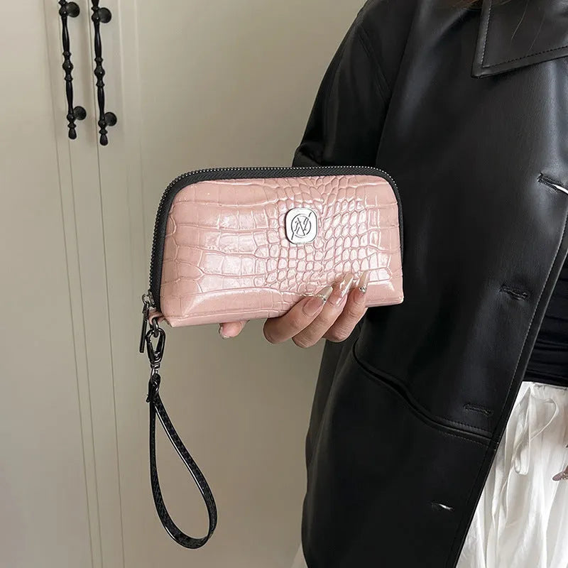 Hand-held rectangular PU mobile phone bag with crystal bamboo pattern in black, shown open to reveal inner pockets.