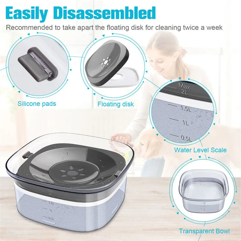 Transparent large 2-litre dog water bowl with floating slow drink disc on a non-slip base.