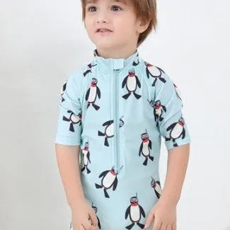 Boy's penguin print long sleeve one-piece swimsuit with matching swimming cap set