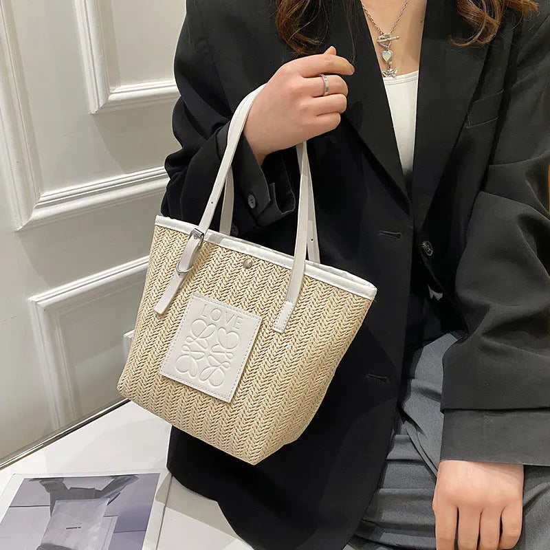 Straw woven women's shoulder bag in European retro style with large capacity and three-dimensional pockets