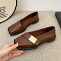 Women's beige artificial leather flat-heeled shoes with square toe and silver metal buckle.