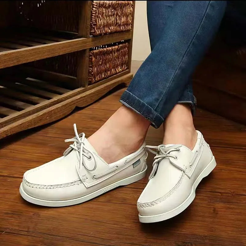 Men's British style casual shoe with round toe and flat heel, shown in a solid colour.