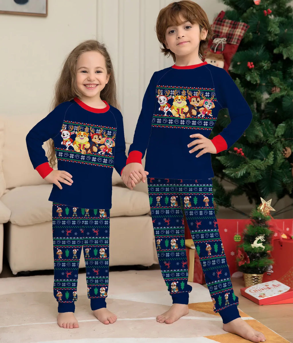 Matching red and black plaid Christmas pyjamas with deer print for men, women, children, and a dog