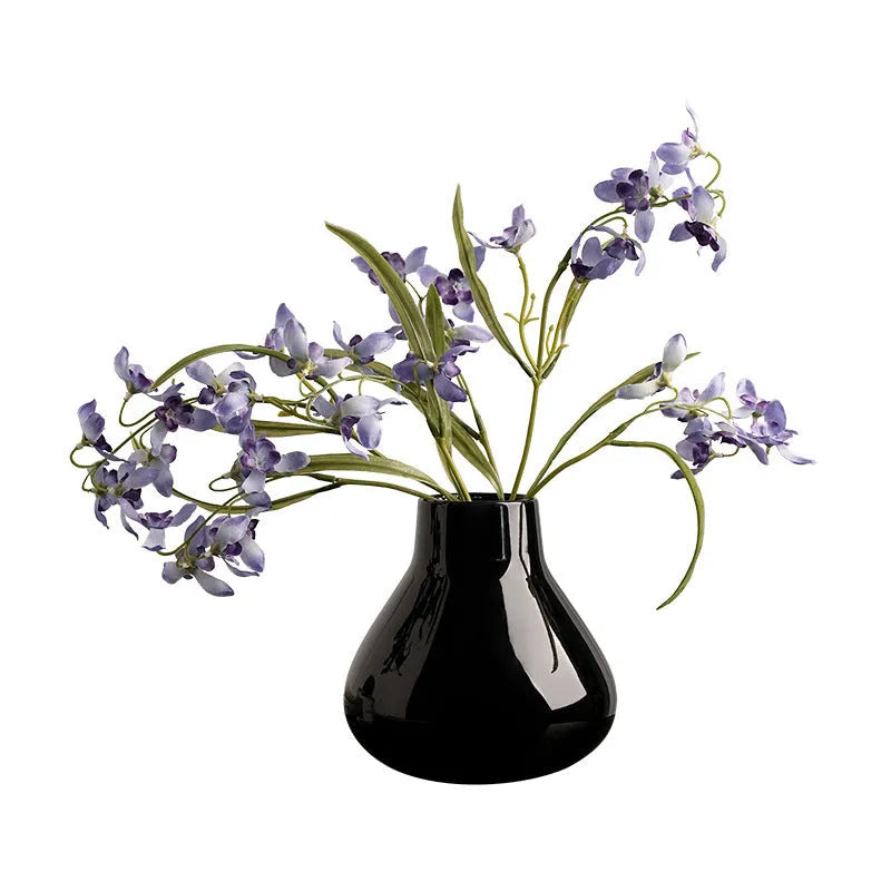 Ceramic round belly vase with coloured glaze finish and two orchid flowers in modern simplicity design