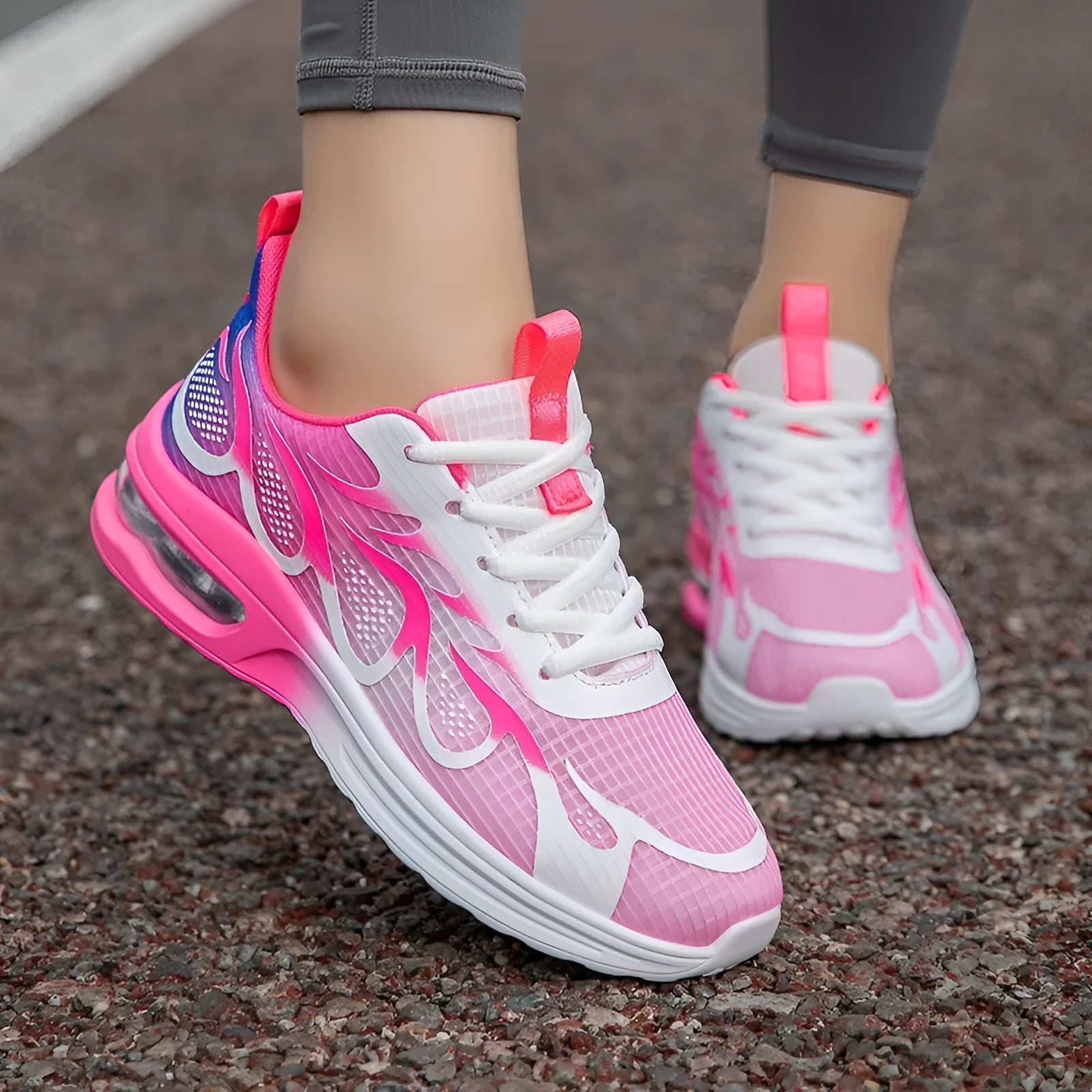 Women's casual mesh sneakers in pink colour with PU sole showing size tag