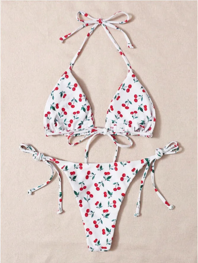 Solid colour halter neck bikini top with backless briefs in nylon.