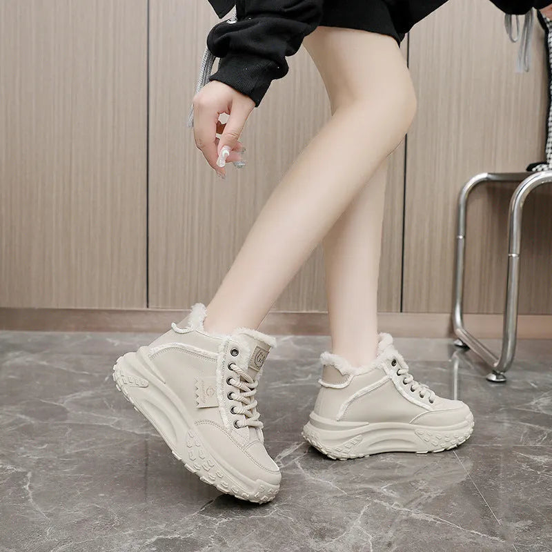 Ladies casual low top sneakers in white with thick rubber sole and round toe