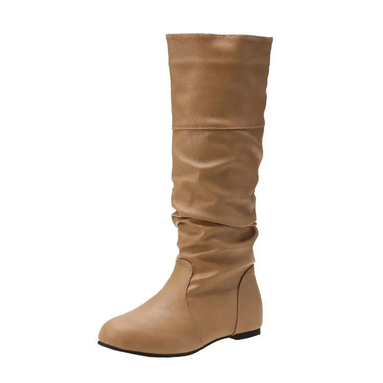 Women's black flat heel slip-on long boots with round toe and high cylinder shaft.