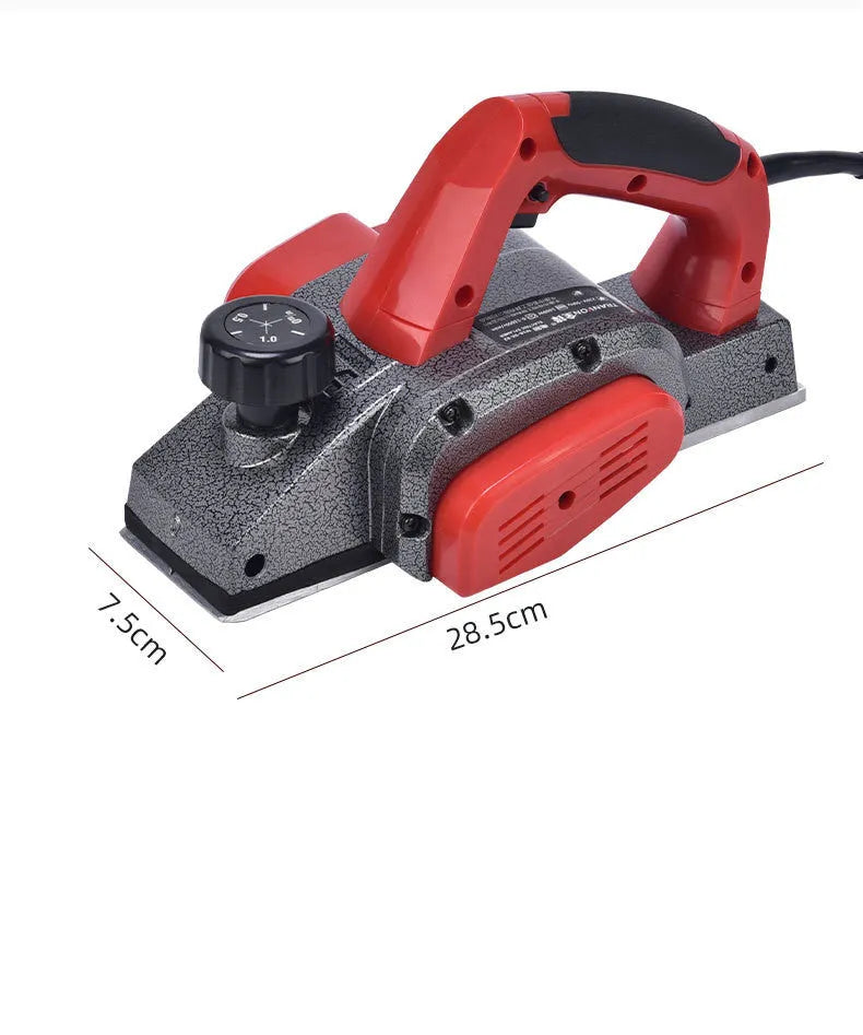 Red electric wood planer with aluminium shell, 82mm planing width