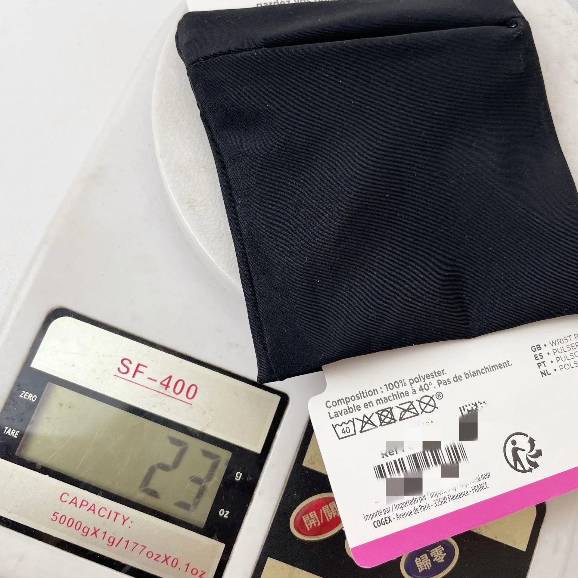 A compact wrist armband sleeve wallet for a mobile phone, shown with dimensions of 10 by 10.5 centimetres.
