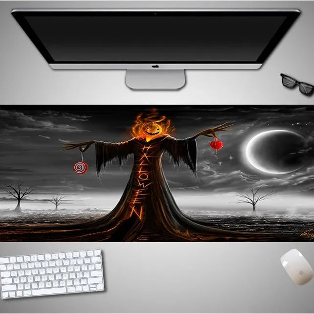Oversized Halloween pattern rubber cloth mouse pad on a desk with non-slip base.