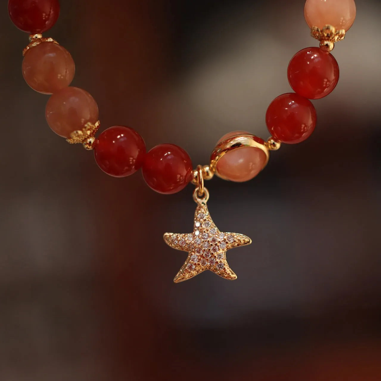 Handmade red agate bracelet with 8mm sands orange sunstone beads and star xiangyun ethnic design