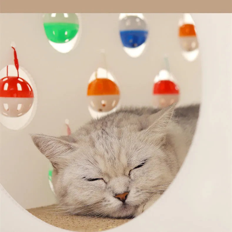 Plastic integrated cat scratch board, nest, and tunnel toy with a bell ball